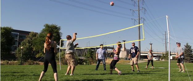 NEWMEDIA team playing volleyball